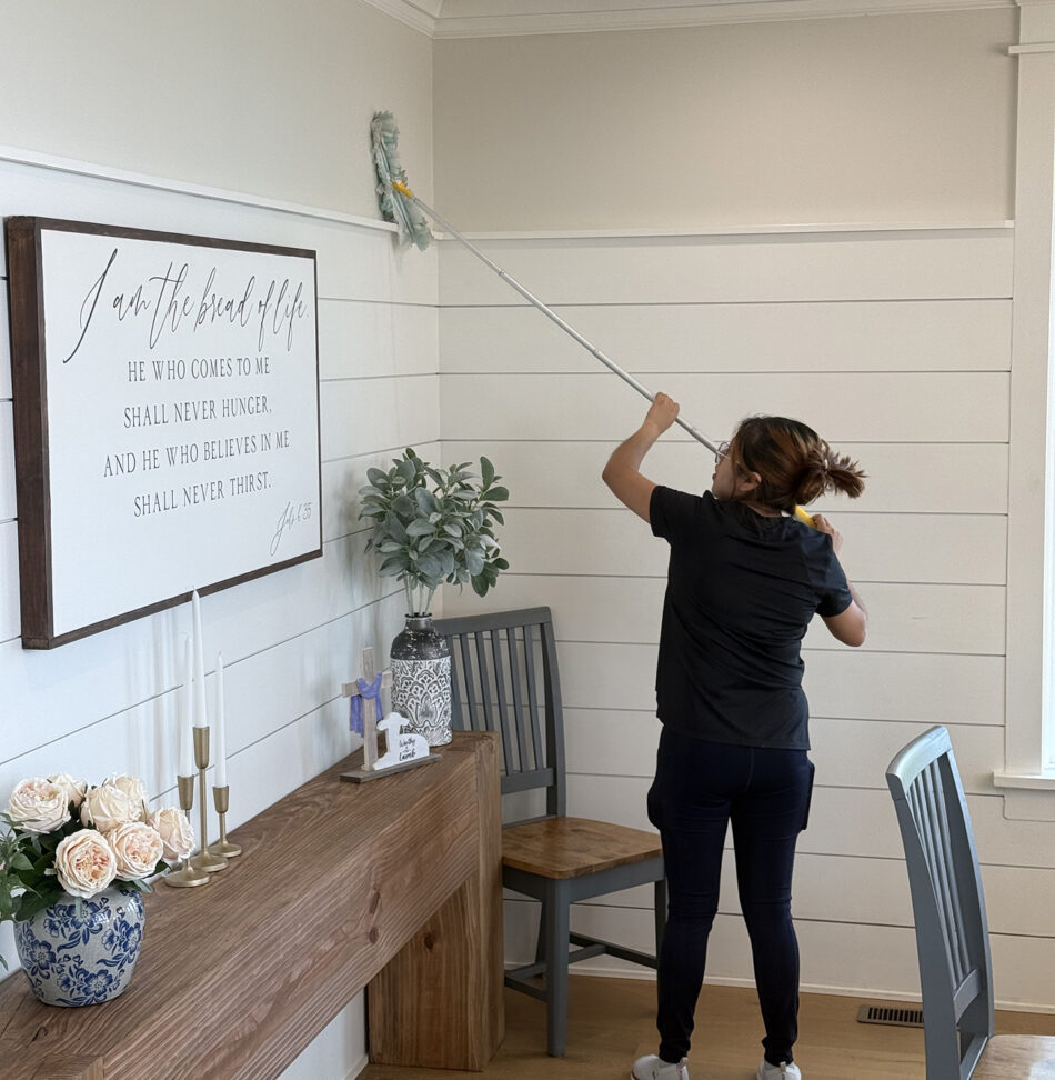 A provider with Professional Edge Cleaning performing their regular cleaning in a client's home.